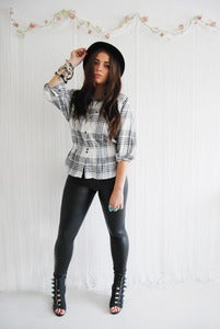 Image of Black and white checked oversize blouse