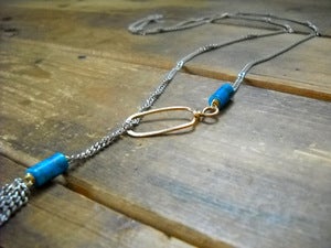 Image of Gilt tie on