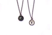 Image of typewriter key initials