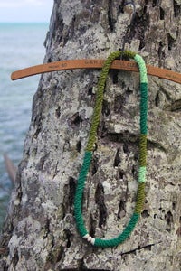 Image of afro lei necklace - maile