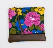 Image of leather-bottomed floral print zipper clutch (multi)