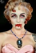 Image of Blue Sparkly Bead Necklace with Blue and Black Pirate Skull and Crossbone Cameo Necklace