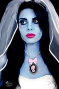 Image of Cream and Black Dead Skeleton Lady Cameo on Cream Rosary Beads with Large Pink Bow Detail
