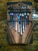 Image of AFRICAN FINGER PIANO + RATTLE
