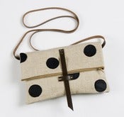 Image of foldover crossbody bag with hand cut leather dots (black)