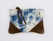 Image of small hand bleached denim zip pouch with leather corners + a METAL zipper