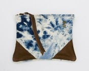 Image of medium sized hand bleached denim zip pouch with leather corners + a METAL zipper