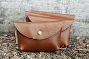 Image of leather pouch, tan