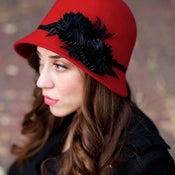 Image of Red Cloche With Black Floral Ribbon Accent