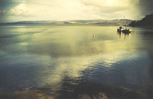 Image of The Boat On The Loch