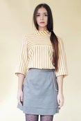 Image of  <FONT COLOR="#DF3A01">falda capas </FON>