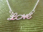 Image of Silver Coloured Metal LOVE Word Necklace Retro Girly Kitsch Romance 