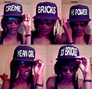 Image of Black Snapbacks with white writing