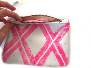 Image of Small neon pink Xs hand-printed leather pouch