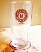 Image of Migration Logo Glass (16oz)