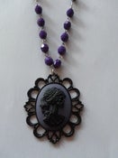 Image of Black Skeleton Dead Lady Purple Cameo on Dark Purple Rosary Shaped Bead Chain