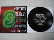 Image of V/A: "SOLID" 4-Way Split 7" (Black Vinyl)