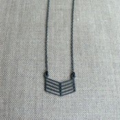 Image of half bent  - oxidized silver