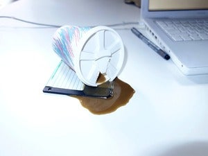 Vintage 1980's Novelty Coffee Spill onto Floppy Disk Image of Vintage 1980's Novelty Coffee Spill onto Floppy Disk