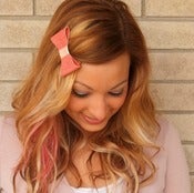Image of the lil' leather bow- coral pattern leather bow barrette