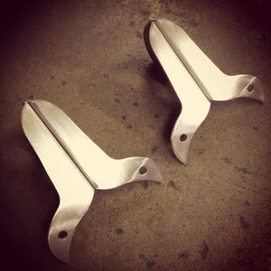 Image of NEW! Old Gold "Bat Wing" CV carb brackets for Sportster