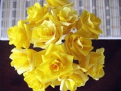 Image of A dozen sunshine roses