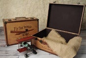 Image of Travel The World Above the Crowd Suitcase