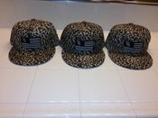 Image of "One nation under SWAG" cheetah strapback 