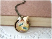 Image of Antique Brass Twin Bluebird Pendant with Cream Flower Necklace