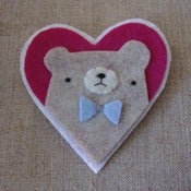 Image of grumpy pudgy bear + bowtie heart