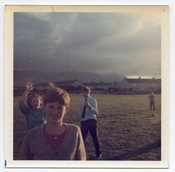 Image of KIDS IN A FIELD WEIRD SKY VINTAGE COLOR SNAPSHOT 