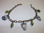 Image of Pulsera charms translucidos geishas