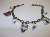Image of Pulsera charms blancos animalitos