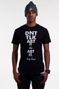 Image of The DNT TLK ABT IT Tee in Black (White/Surf Green)