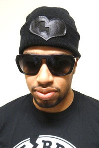 Image of BLACK  LEATHER HEART SKULLY