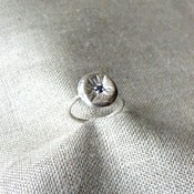 Image of sunken ring with sapphire