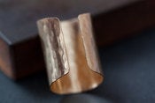Image of simple gold shield ring