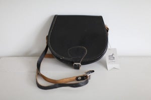 Image of 1970s small black saddle bag