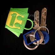 Image of WITH LOGO - Céline my phone Headphone Plug - green/yellow
