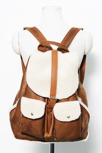 Image of fur detail rucksack by Zip It