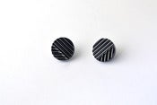 Image of 'naname' black nickel plated earrings round